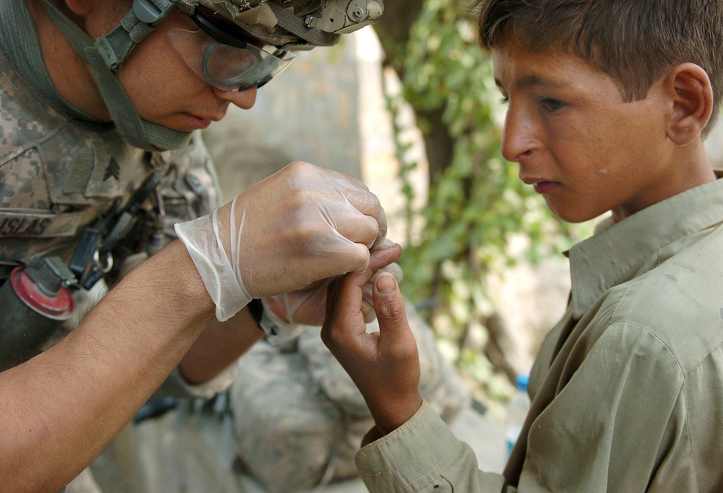 10th Mountain Medic treats Afghan boy